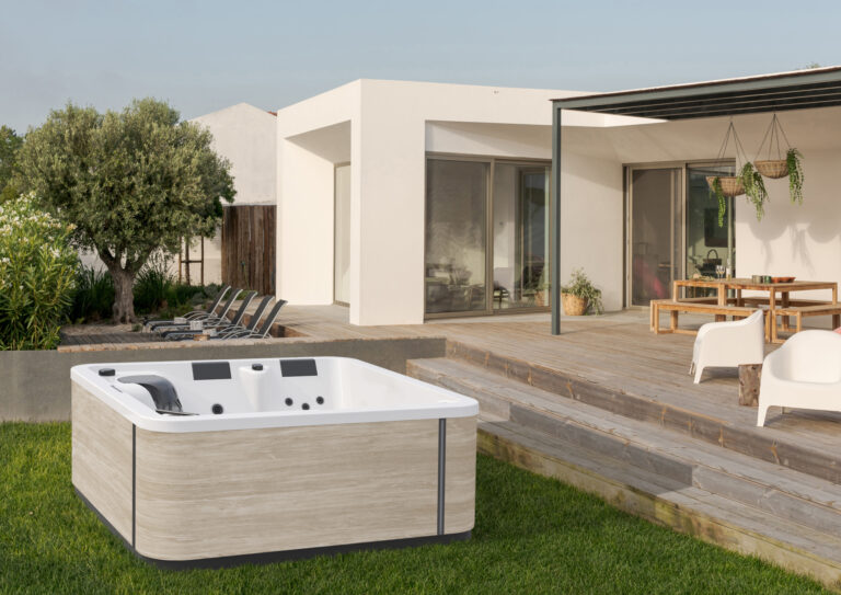 Modern house with garden swimming pool and wooden deck